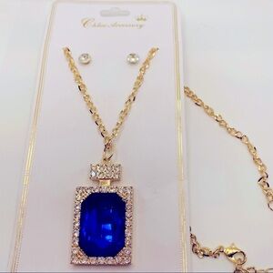 Necklace Crystal In Blue. Shape of Perfume Bottle with Earrings and Golden chain